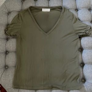Kittenish olive tee.